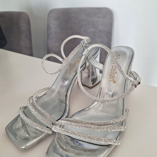 Silver high heel shoes size 39