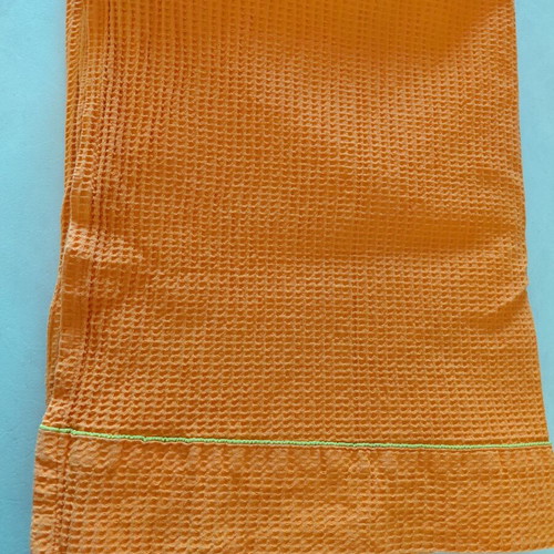 Pique blanket like new, orange cotton with green stripe