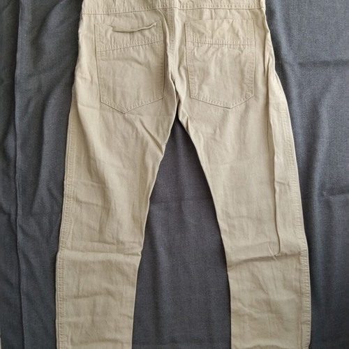Beige fabric pants for 6-year-old boy, size 116 cm