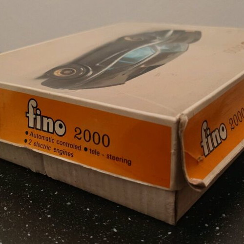 Fino 2000 plastic toy car used with missing parts