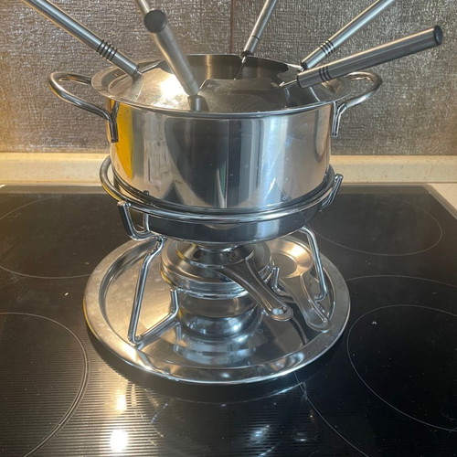 Fondue set used with 6 forks