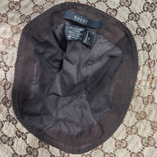 Gucci hat like new with metal details and brown lining