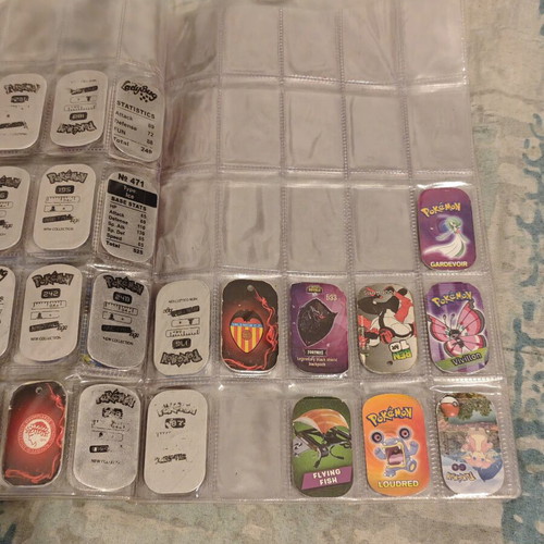 Μεταλλικά tags Pokémon με άλμπουμ