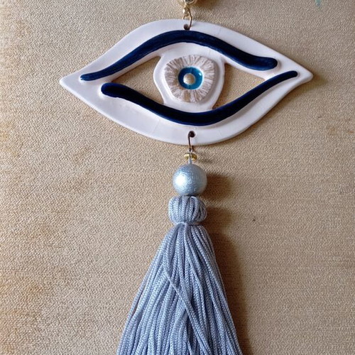 Handmade hanging eye gouri, like new, clay 15x8 cm