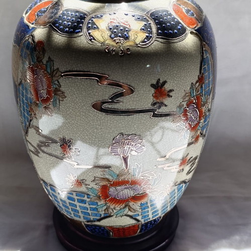 Satsuma porcelain vase with wooden base
