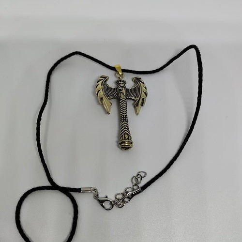 Pendant Double Axe like new, gold-colored steel with black cord