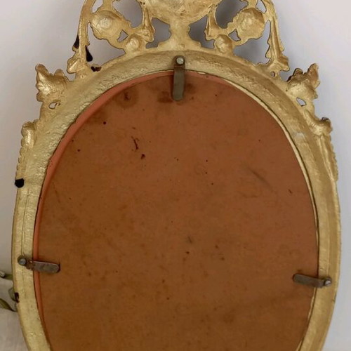 Oval bronze mirror used, antique style with gold paint