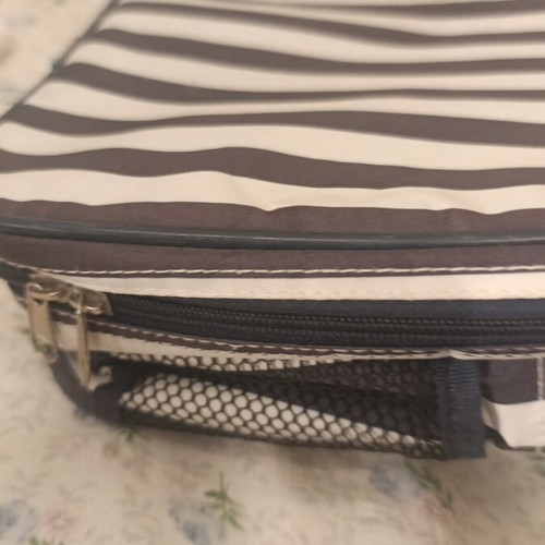 Insulated backpack with bottle holder like new, black and white striped
