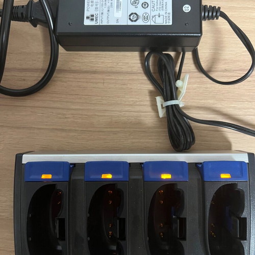 Intermec AC1 four slot battery charger with 4 batteries AB1 used