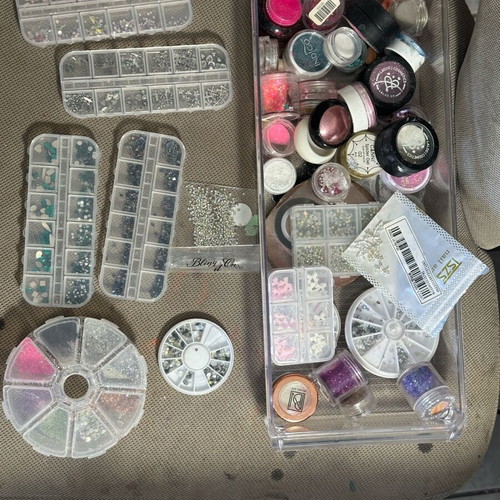 Nail products like new, 110 nail polishes, dual forms, gel tips, powders, rhinestones