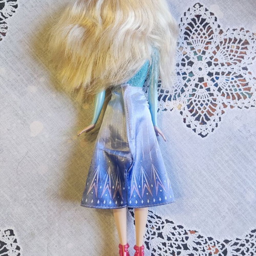 Elsa doll used with skirt tear