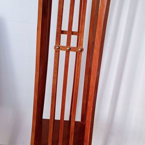 Handcrafted tall wooden plant stand with carved floral details