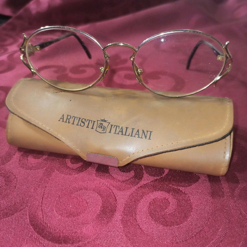 Eyeglass frame used, black and gold, with Artisti Italiani case