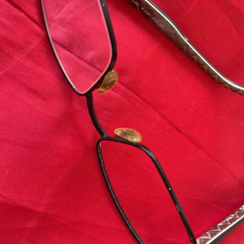 Vogue eyeglass frame like new with black and printed design