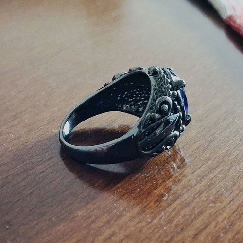 Ring with blue sapphire new, black rhodium plating