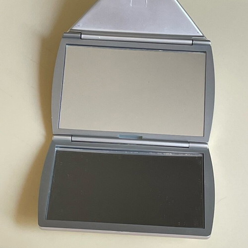 Folding Bag Mirror like new with magnifying side