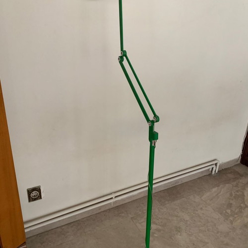 Modern floor lamp used with rotating arm and LED lighting
