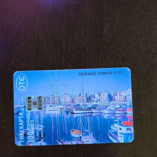 Greek phone card used, left writing