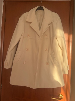 Coat in cream color like new