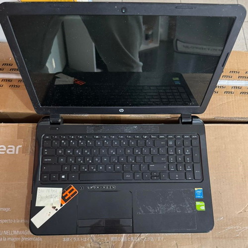 HP 15-R212NV laptop used, for parts or repair, Intel Core i5, 4GB RAM, 128GB SSD