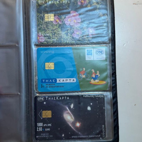 Vintage OTE phone card collection in black album