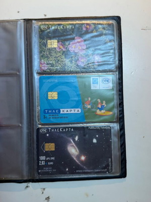 Vintage OTE phone card collection in black album