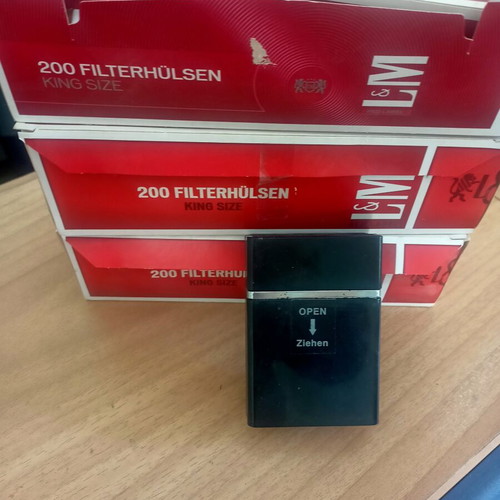 Cigarettes and tobacco roller with case like new