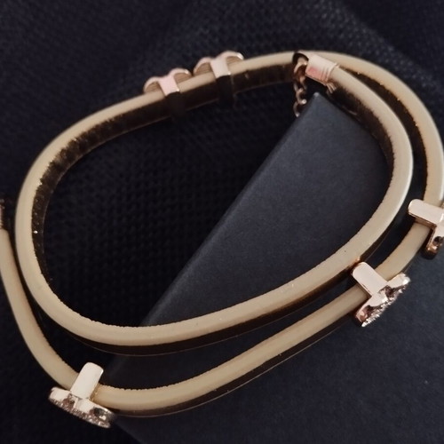 Gold leather bracelet with hearts, new