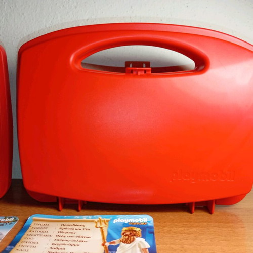 Playmobil cases used with cards and brochures