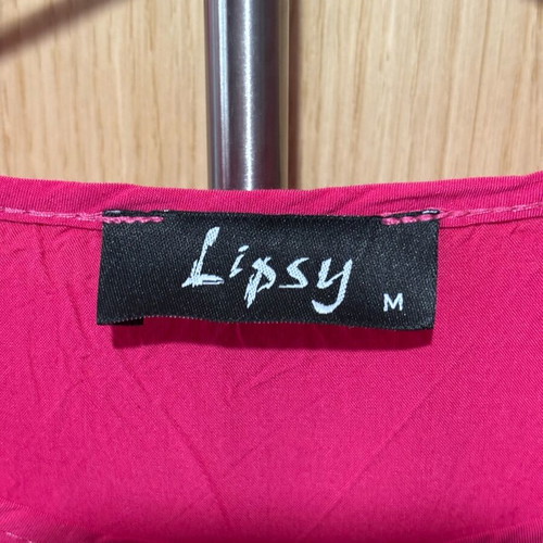 Fuchsia blouse size M like new