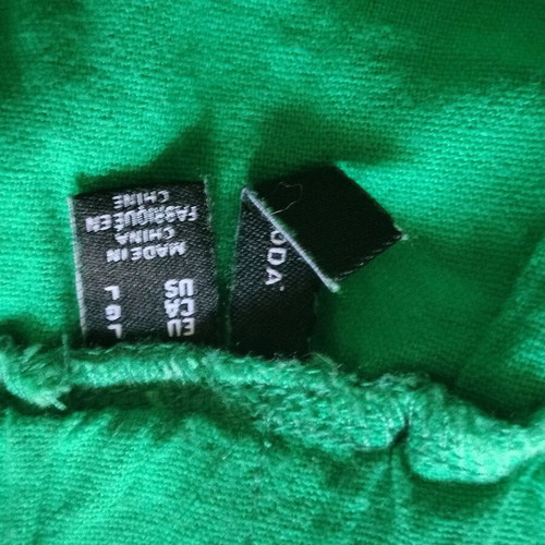 Anel green short skirt like new with ruffles, size L 40 12