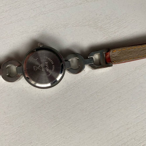 Avon women's watch like new, gold with brown strap