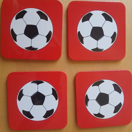 Football coasters in metal box, like new