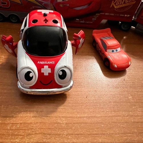 Ambulance toy car used with opening doors and pull-back mechanism
