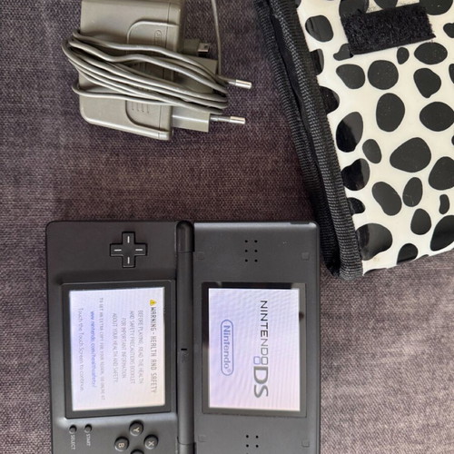 Nintendo DSLite used with 8 games and case