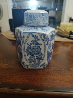 Hexagonal decorative vase with scenes