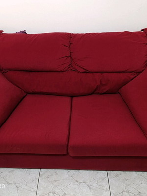 Two-seater waterproof sofa like new with removable cushions