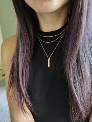 Triple necklace like new, gold-colored