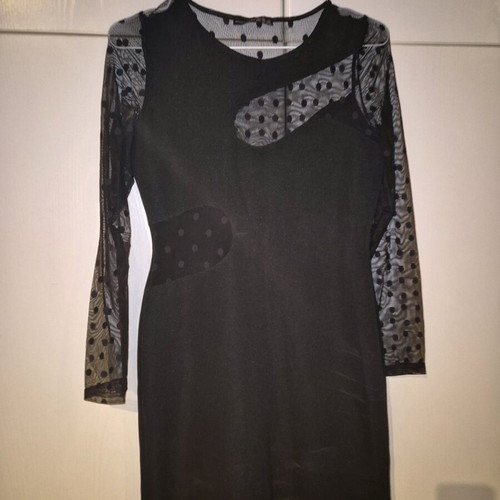 Elastic black dress new with transparent details size L