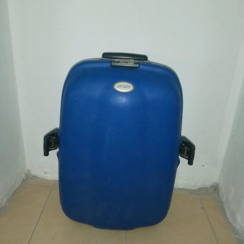 Hard plastic suitcase with lock and wheels