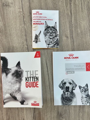Royal Canin booklets and cup for cats new