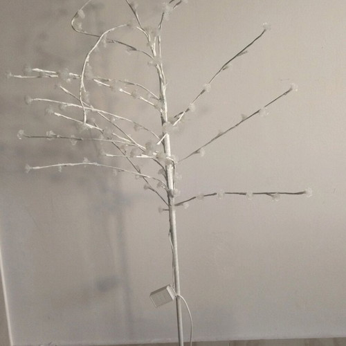 Decorative tree with roses used with lights and metal base