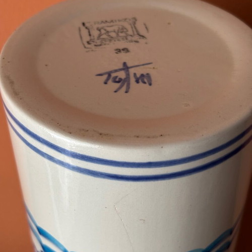 Ceramic vase used with sea theme by artist Tolis