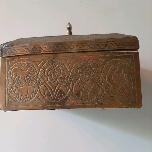 Oriental copper box used with carved decorations