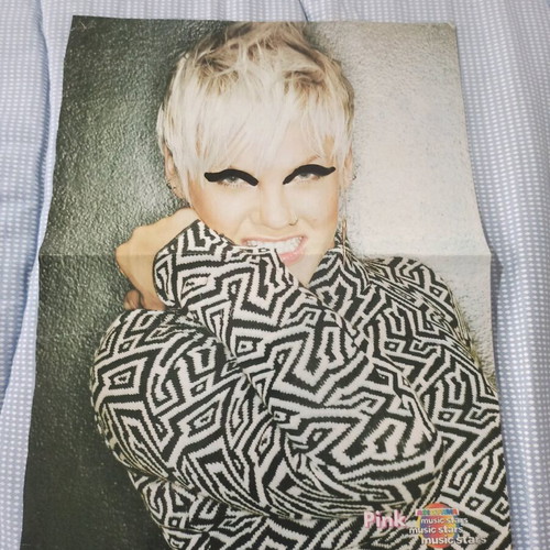 Pink poster used with painted eyeliner