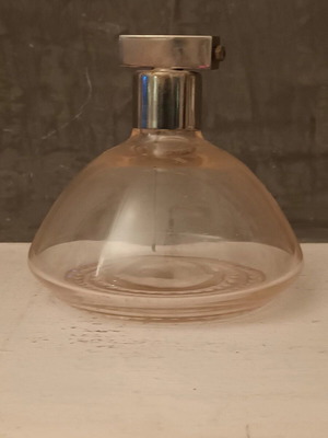Vintage perfume bottle used, light pink shade with stainless spray