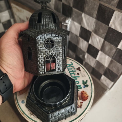 Candle holder used, church-shaped without glass cup, black