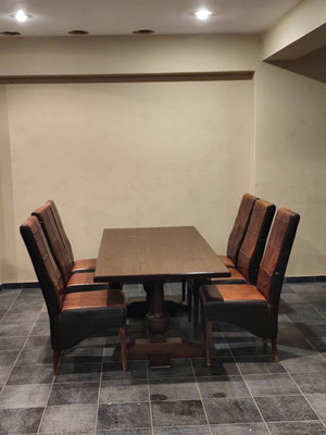 Solid Wood Dining Set with 6 High-Back Leather Chairs used