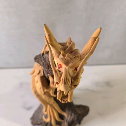 Wooden handmade dragon used with wooden base