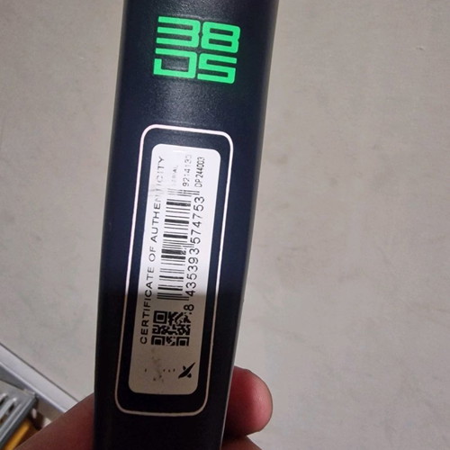 Padel racket used, moderate condition with small cracks
